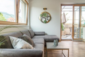 Ferienwohnung mit Garage, Fahrradraum und sehr großer sonnenverwöhnten Terrasse Lagundo